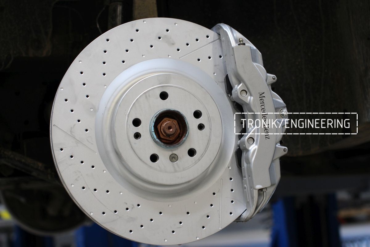 front axle brake rotor 390-36 8 pot Brembo caliper adapters by tro-nik