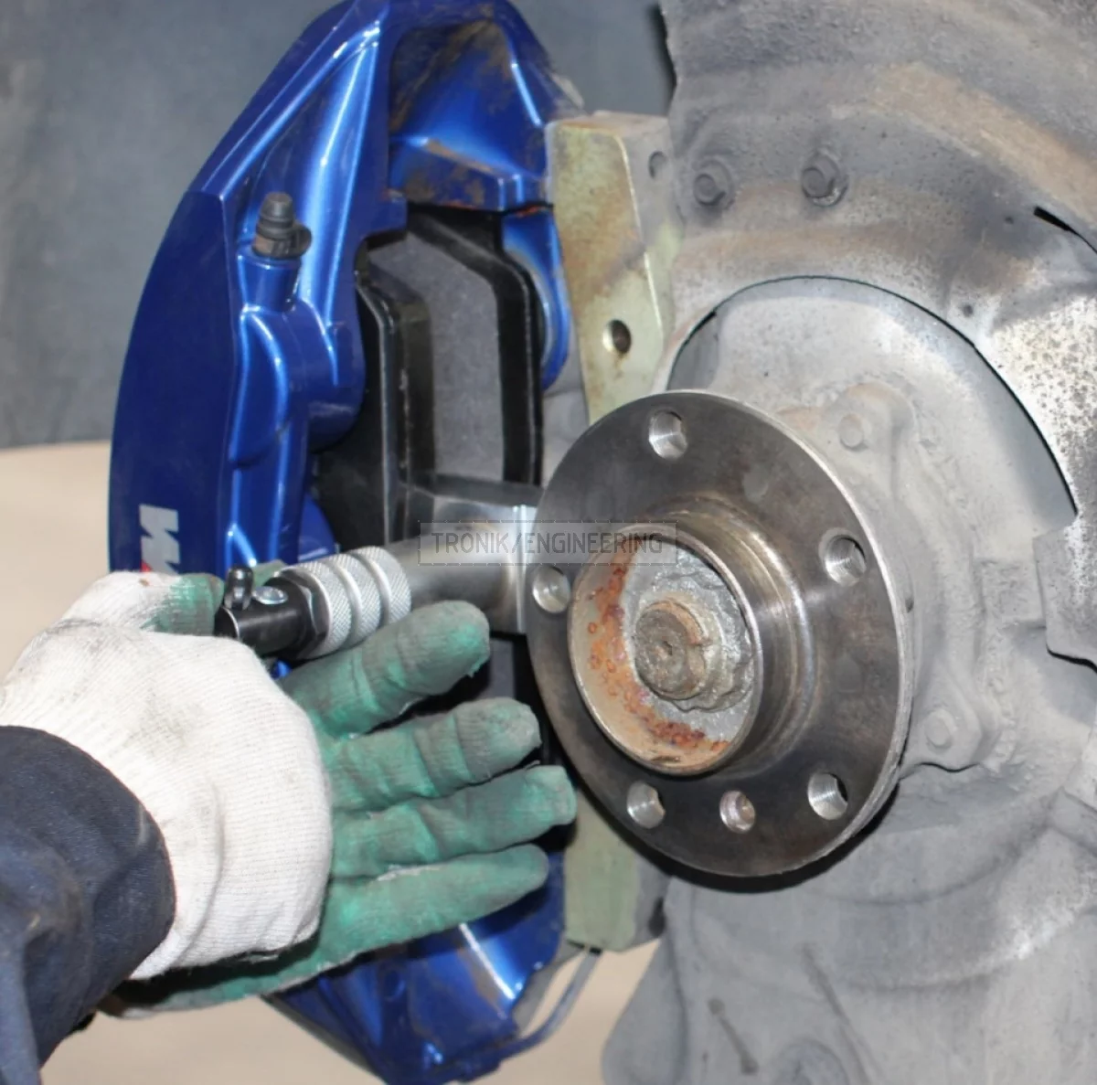 mounting brake pads & control brake liquid levels in surge tank