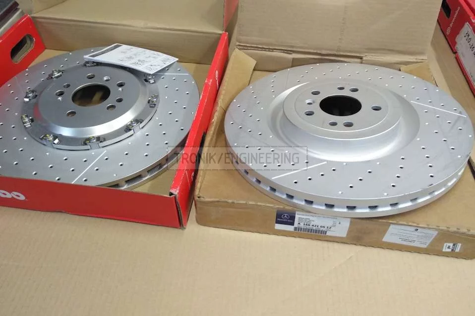 Modified Brembo rotor (left) & original rotor (right) for Mercedes Benz W166 63 AMG