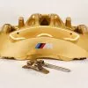 34 11 7 850 464 Gold front right caliper