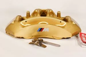 34 11 7 850 464 Gold front right caliper