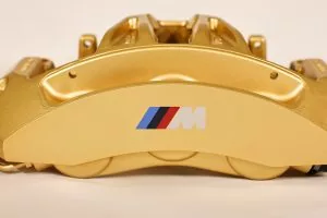 34 11 7 850 464 Gold front right caliper