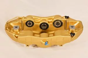 34 11 7 850 464 Gold front right caliper