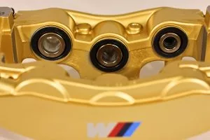 34 11 7 850 464 Gold front right caliper