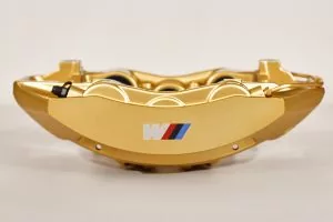 34 11 7 850 464 Gold front right caliper