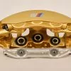 34 11 7 850 463 Gold front right caliper