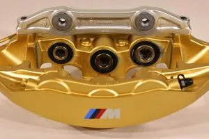 34 11 7 850 463 Gold front right caliper