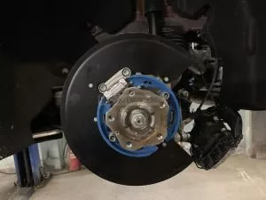 dust shield for bigger brake rotor