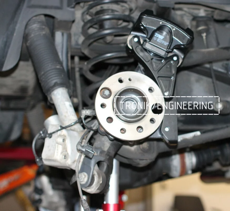 installing parking brake adapter & caliper rear axle