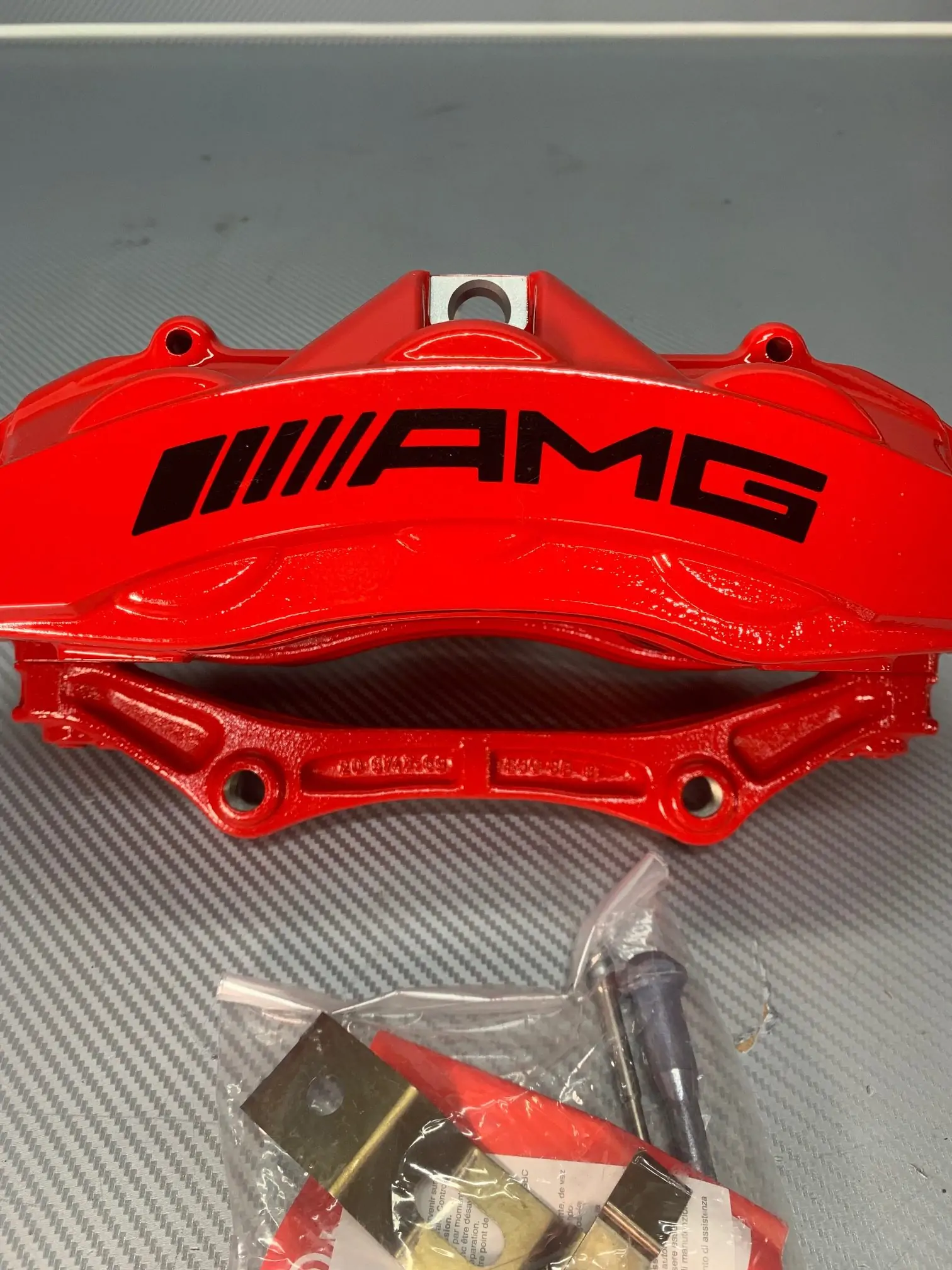 A 166 421 40 98, Mercedes-Benz W166 front right red caliper. pic. 1